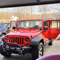 Red Jeep after exterior detailing